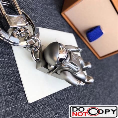 louis vuitton spaceman figurine bag charm and key holder|LOUIS VUITTON Monogram Satellite Spaceman Figurine Bag .